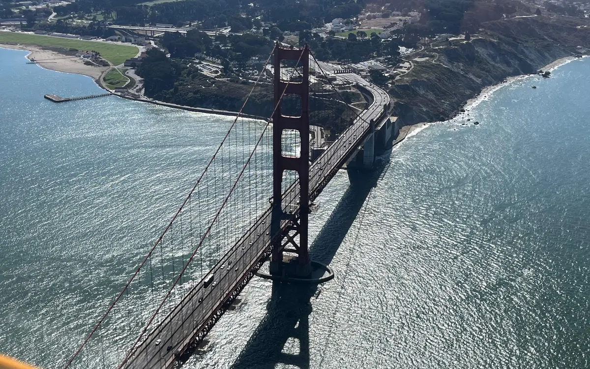 The deck and towers of the Golden Gate Bridge seen from directly overhead